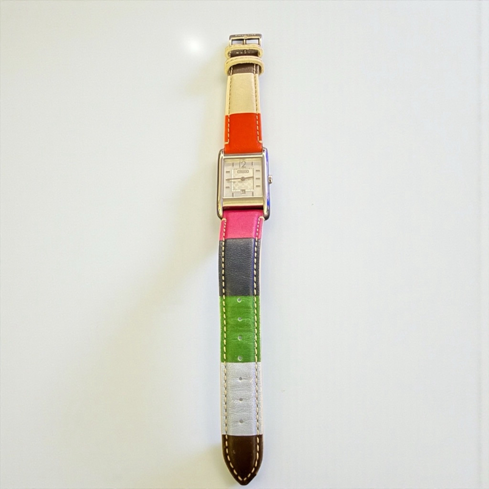 Vintage Coach Reese Watch with a Silver Case and Multi Color Leather Strap
